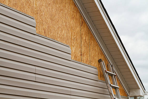 Professional Emergency Siding Repair technician working in Parkton, MD